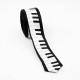 Corbata teclat blanc i negre